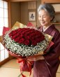 画像1: 沖縄で長寿祝いに贈る赤バラ108本とカスミソウの花束 (1)